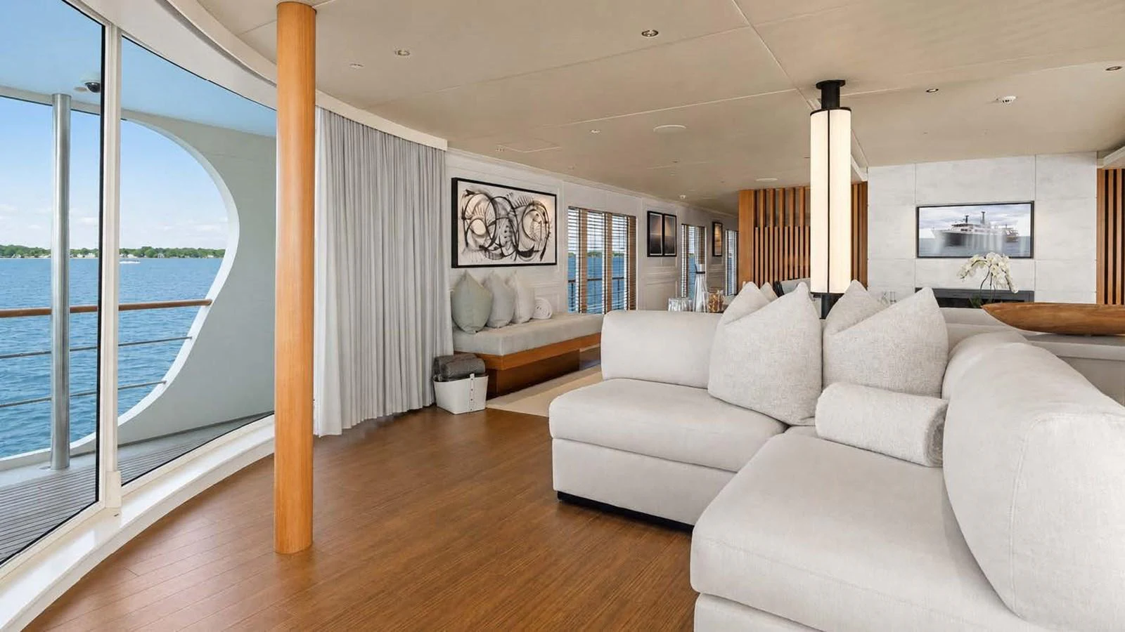 The salon offers a spacious and elegant area with panoramic views of the water. aboard JUST B Yacht for Sale