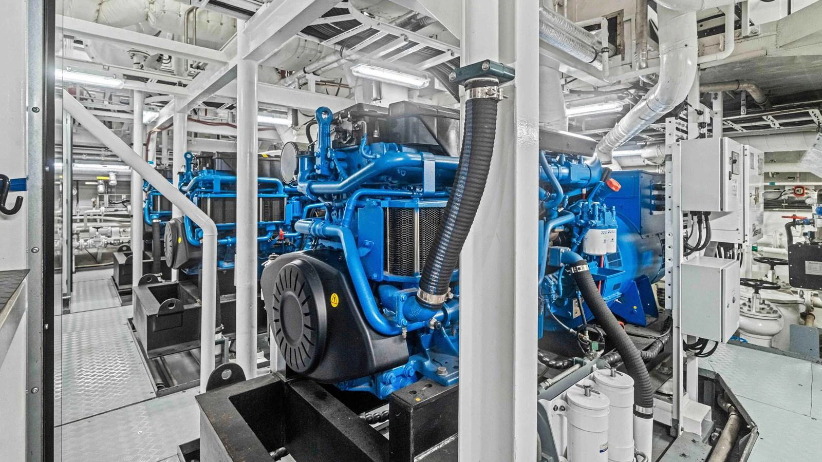 The engine room showcases the yacht's powerful and meticulously maintained machinery. aboard JUST B Yacht for Sale