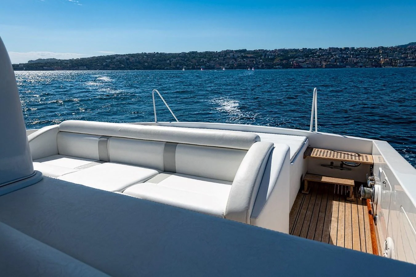The aft deck offers a spacious and comfortable seating area with stunning views of the water. aboard WHITE & SILVER Yacht for Sale