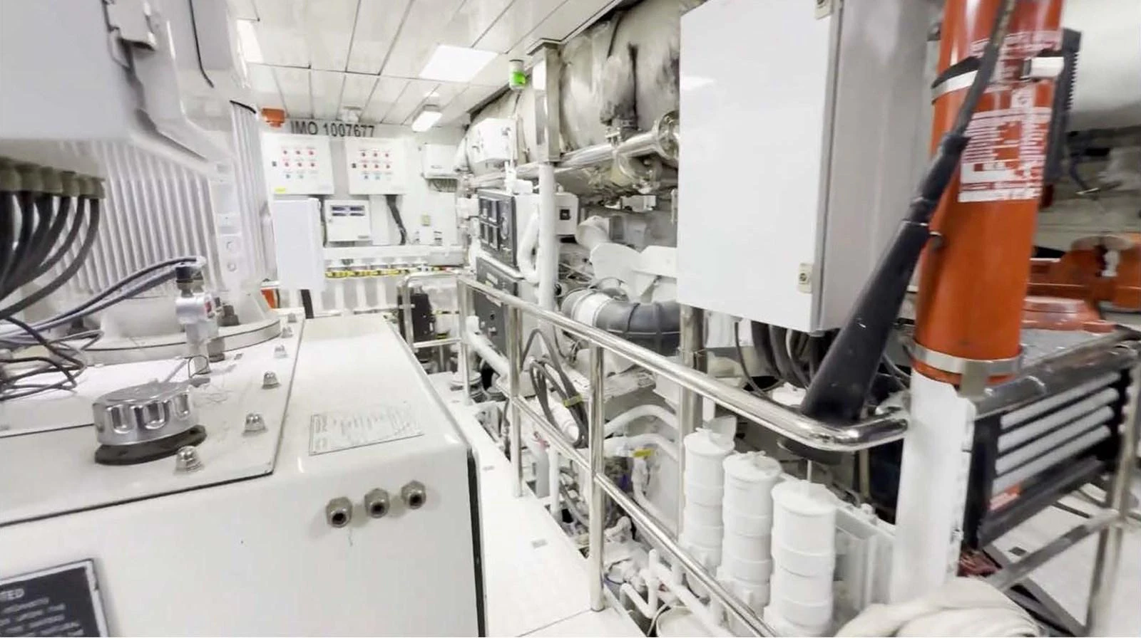 The image showcases the yacht's well-maintained engine room with advanced machinery and equipment. aboard DOMANI Yacht for Sale