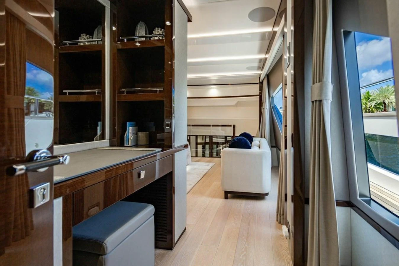 A luxurious interior space featuring a comfortable seating area and elegant wooden cabinetry. aboard STAR OF THE SEA Yacht for Sale