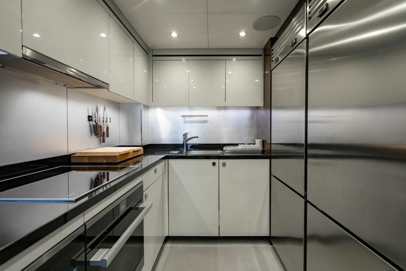 The modern galley features sleek stainless steel appliances and ample storage space. aboard STAR OF THE SEA Yacht for Sale