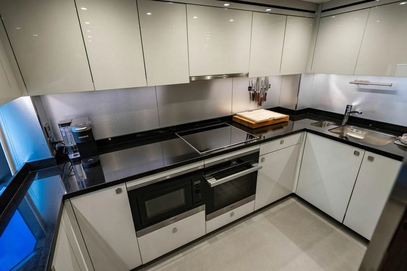 The modern galley features sleek cabinetry and high-end appliances, perfect for gourmet cooking. aboard STAR OF THE SEA Yacht for Sale