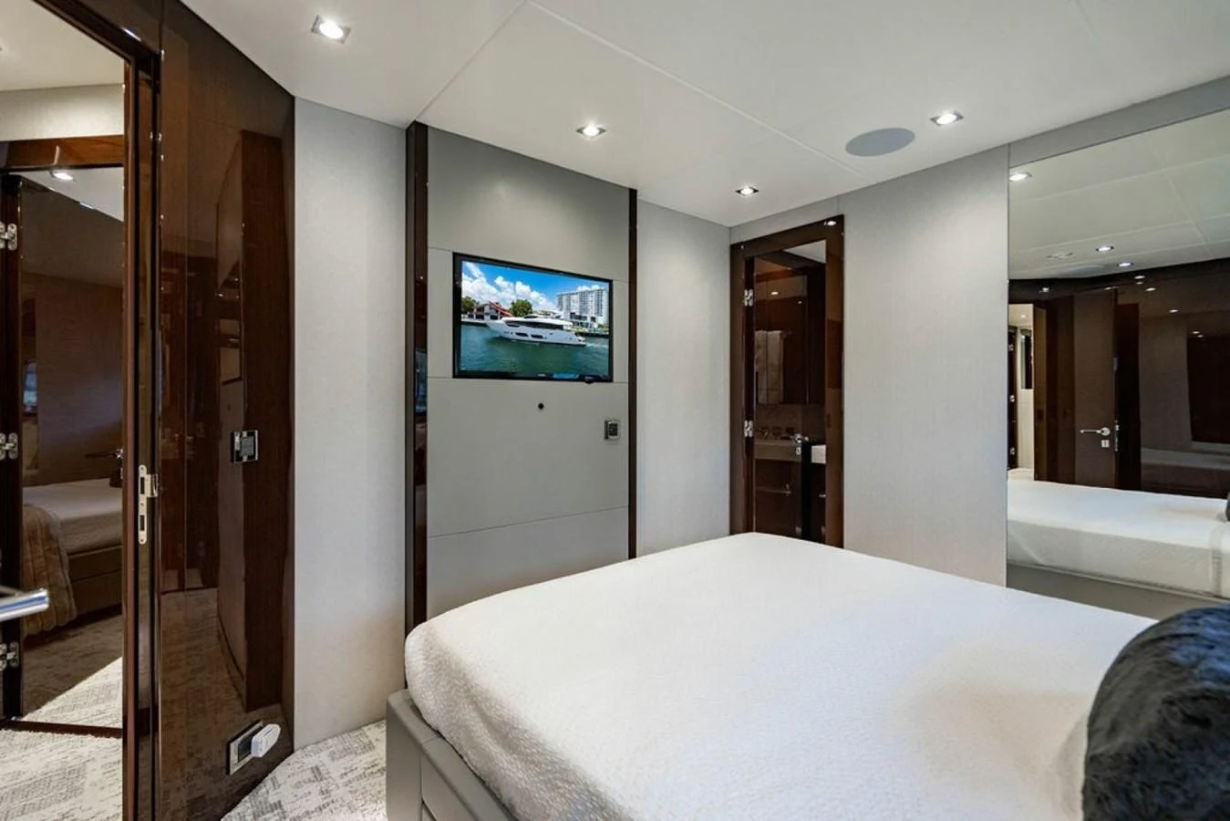 The stateroom features a plush bed, modern decor, and a flat-screen TV for ultimate relaxation. aboard STAR OF THE SEA Yacht for Sale