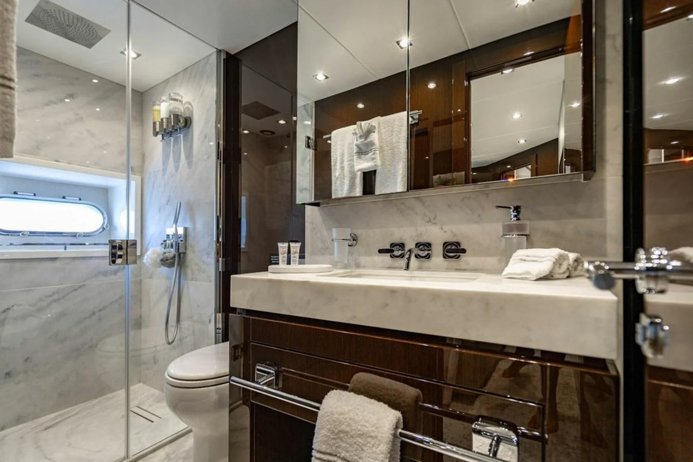 The yacht's bathroom features elegant marble surfaces and modern fixtures. aboard STAR OF THE SEA Yacht for Sale