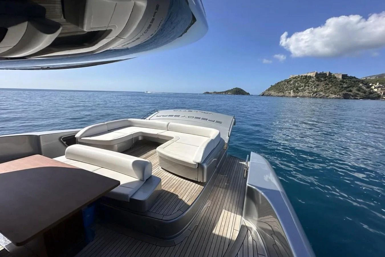The aft deck offers a luxurious seating area with stunning views of the surrounding waters and coastline. aboard SPEEDY BEAR Yacht for Sale