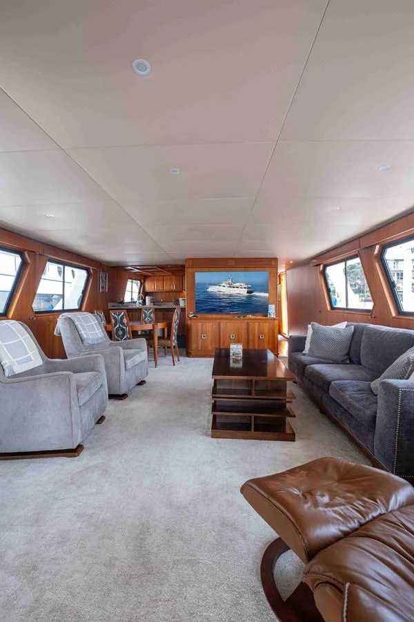 The salon offers a spacious and comfortable seating area with elegant furnishings and ample natural light. aboard SAPPHIRE SEA II Yacht for Sale