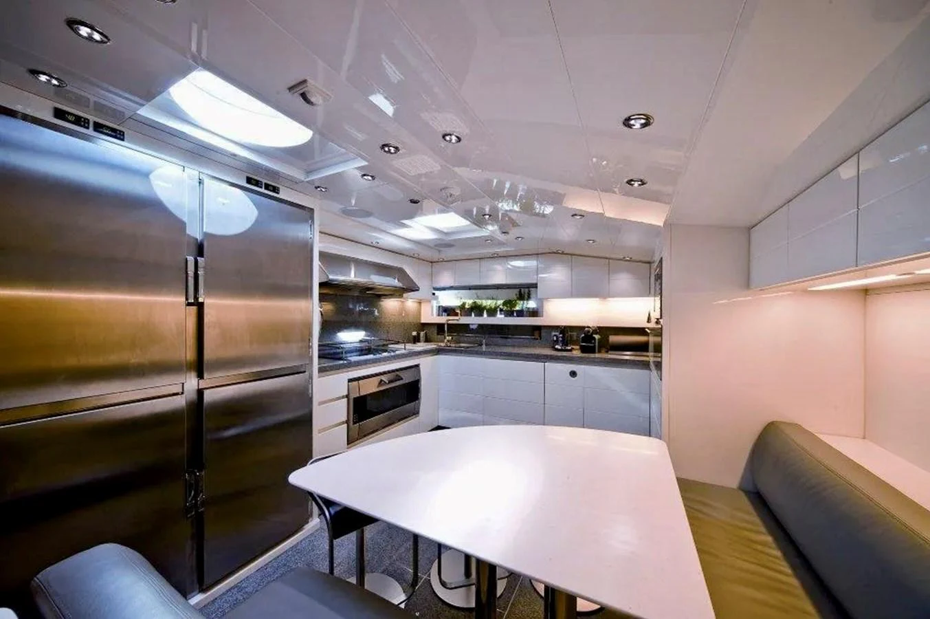 The yacht's galley features modern appliances and sleek design. aboard BALANDRAU Yacht for Sale