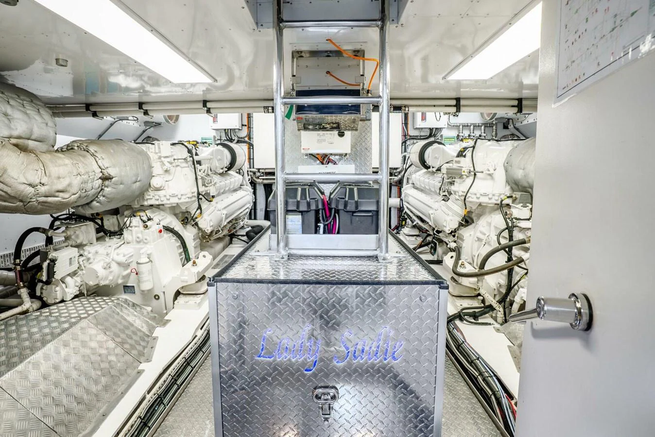 The yacht's engine room showcases powerful machinery and organized systems. aboard LADY SADIE Yacht for Sale
