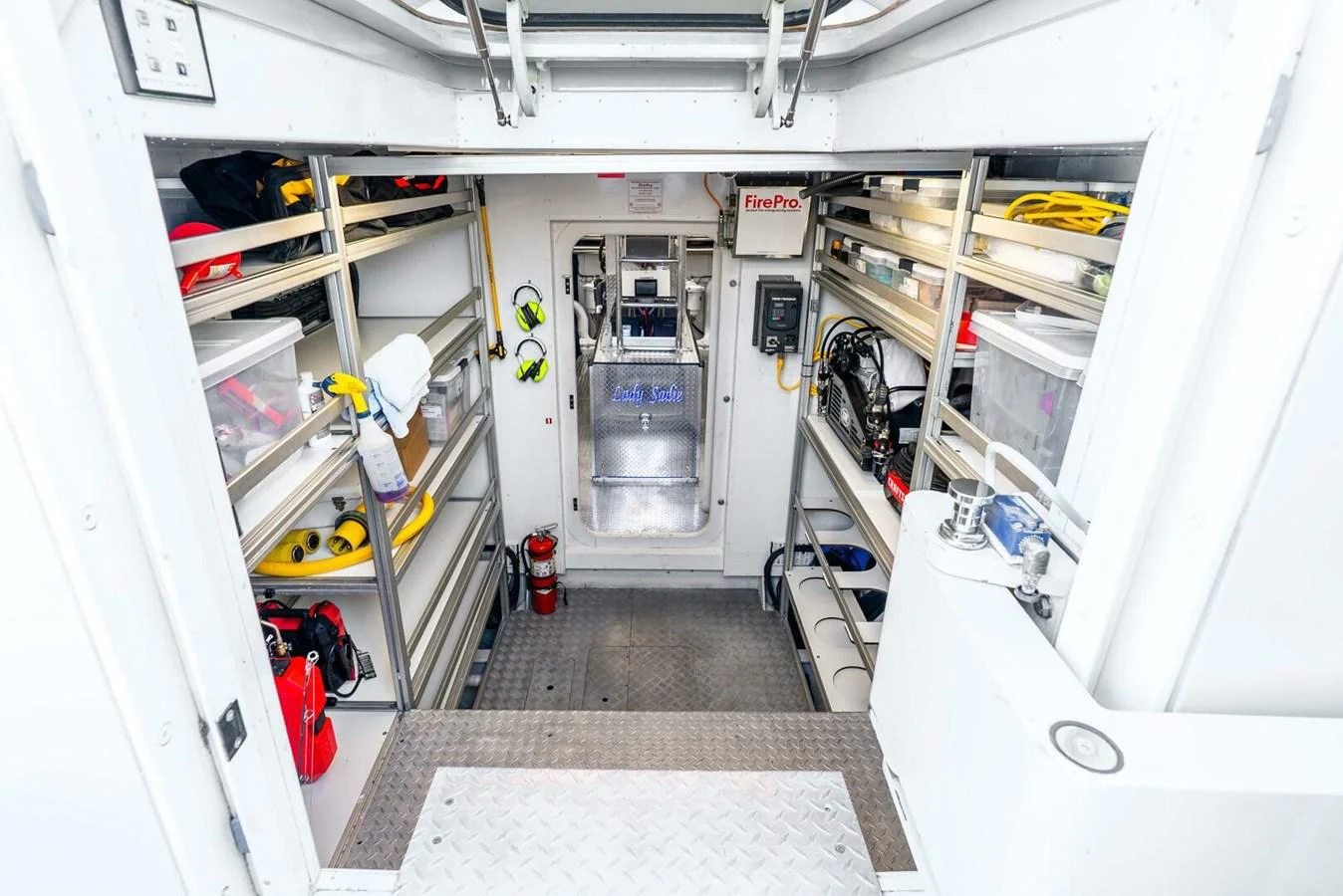 A well-organized storage area with various equipment and supplies neatly arranged. aboard LADY SADIE Yacht for Sale