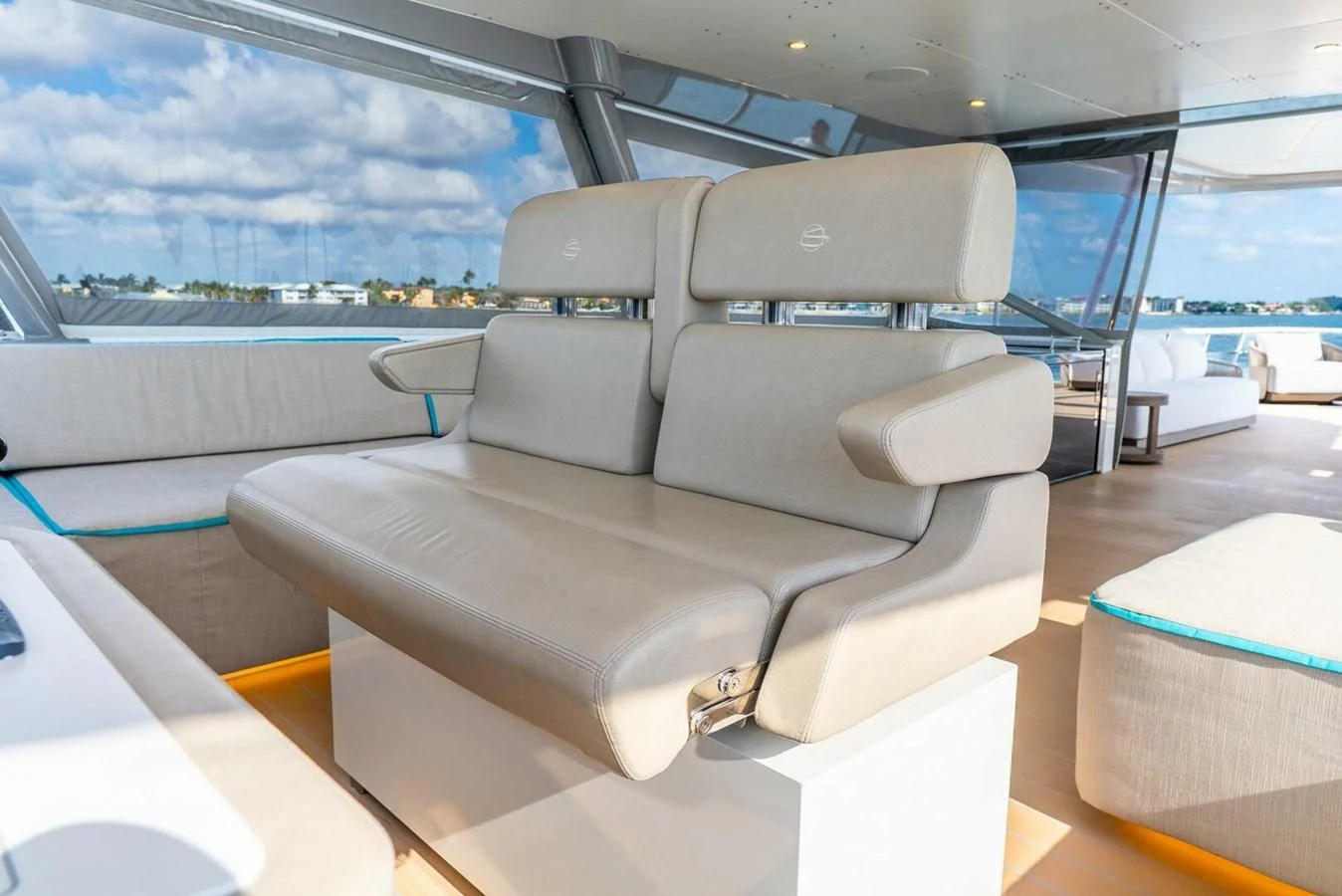 The helm area features comfortable, modern seating with a view of the surroundings. aboard LADY SADIE Yacht for Sale