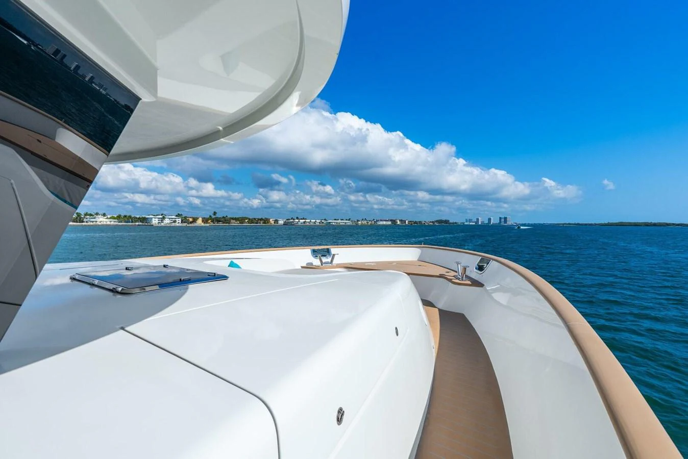 The yacht's bow offers a spacious and sleek area for enjoying the ocean views. aboard LADY SADIE Yacht for Sale