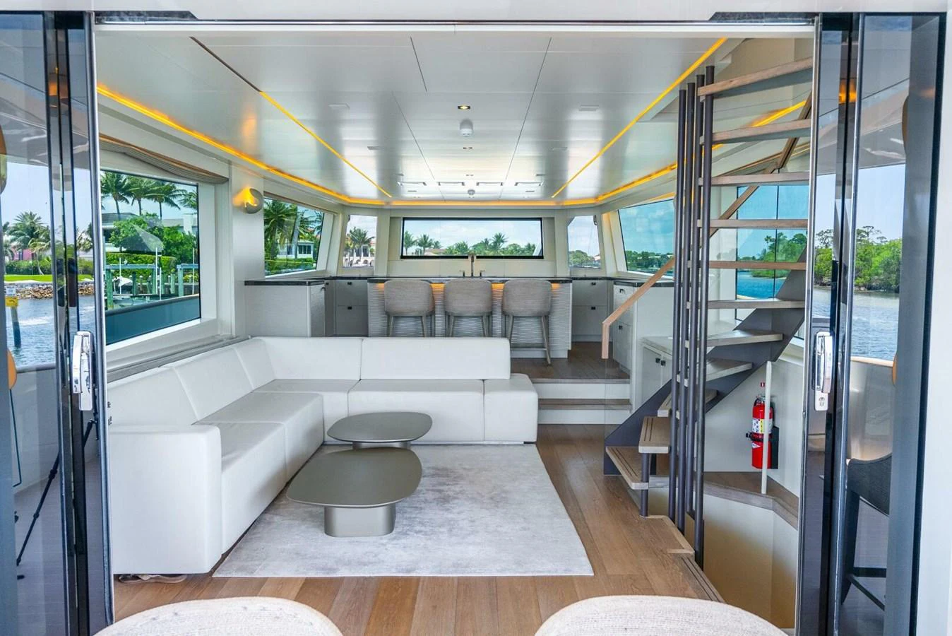 The yacht's salon features modern furnishings and ample natural light. aboard LADY SADIE Yacht for Sale
