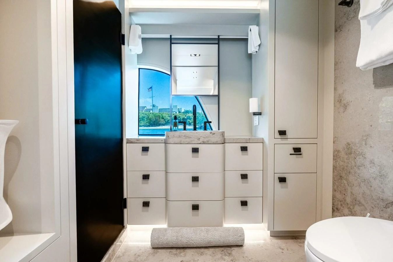 The yacht's bathroom features modern fixtures and a sleek design. aboard LADY SADIE Yacht for Sale