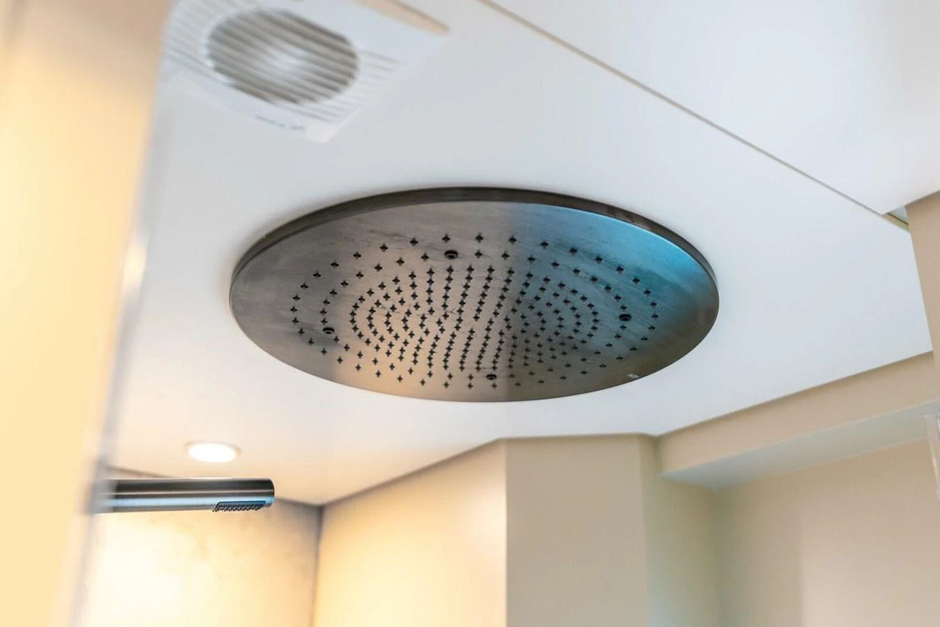 A modern overhead shower fixture in the yacht's bathroom. aboard LADY SADIE Yacht for Sale