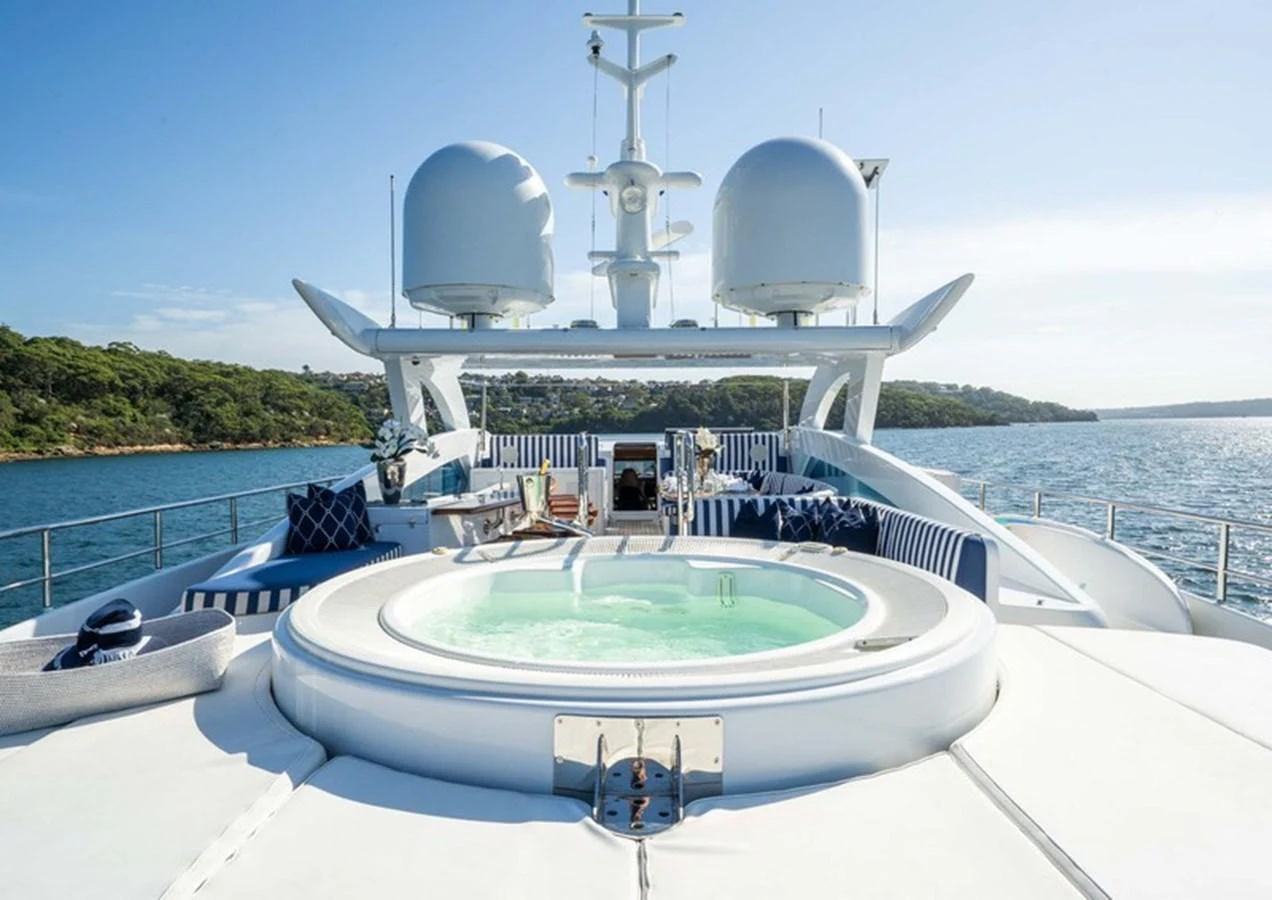 The sundeck features a luxurious jacuzzi with stunning views of the surrounding waters. aboard LUMIR Yacht for Sale