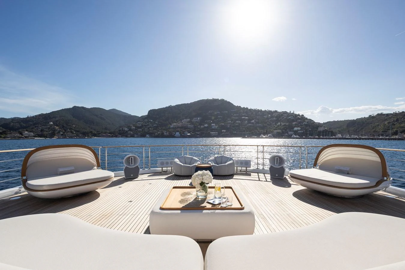 The sundeck offers a luxurious space for relaxation with stunning views of the surrounding waters. aboard SYNTHESIS Yacht for Sale