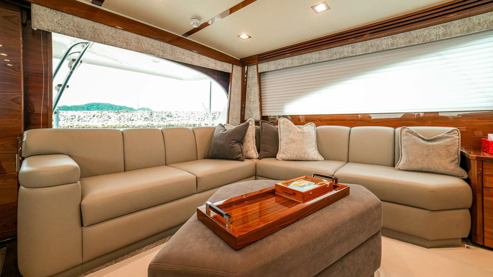 The yacht's salon features a spacious and comfortable seating area with elegant decor. aboard FREE SPOOL Yacht for Sale