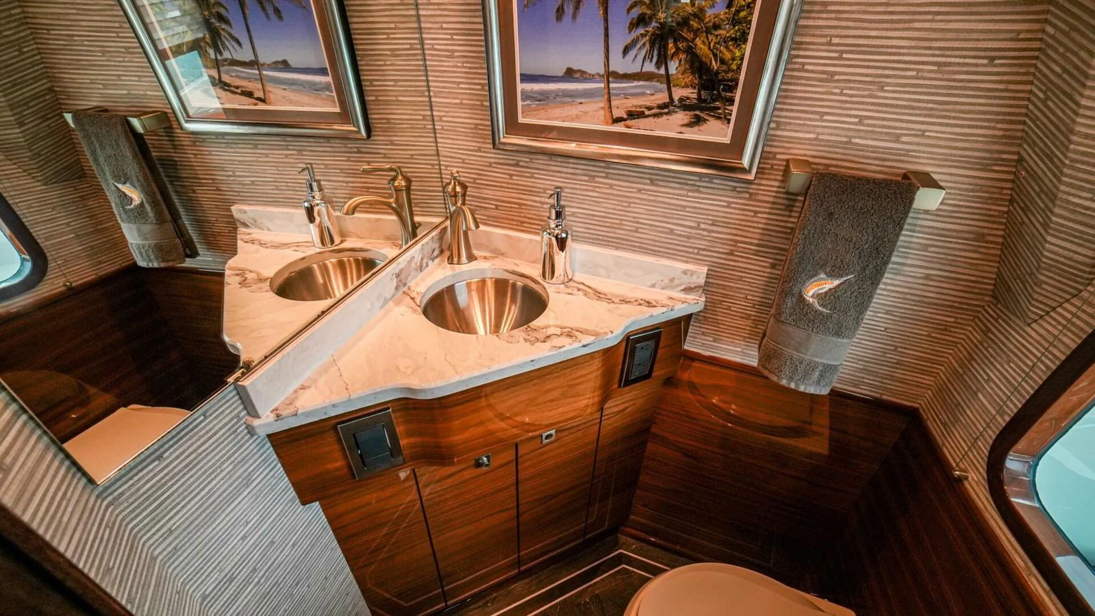A luxurious yacht bathroom featuring elegant fixtures and stylish decor. aboard FREE SPOOL Yacht for Sale