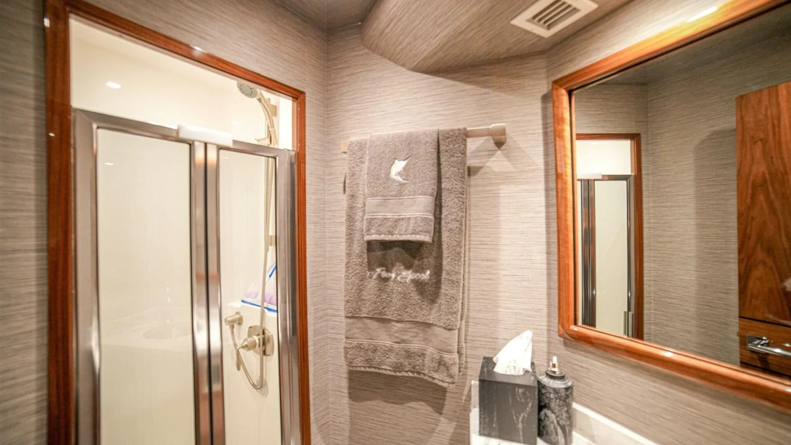 A well-appointed yacht bathroom with modern fixtures and elegant decor. aboard FREE SPOOL Yacht for Sale