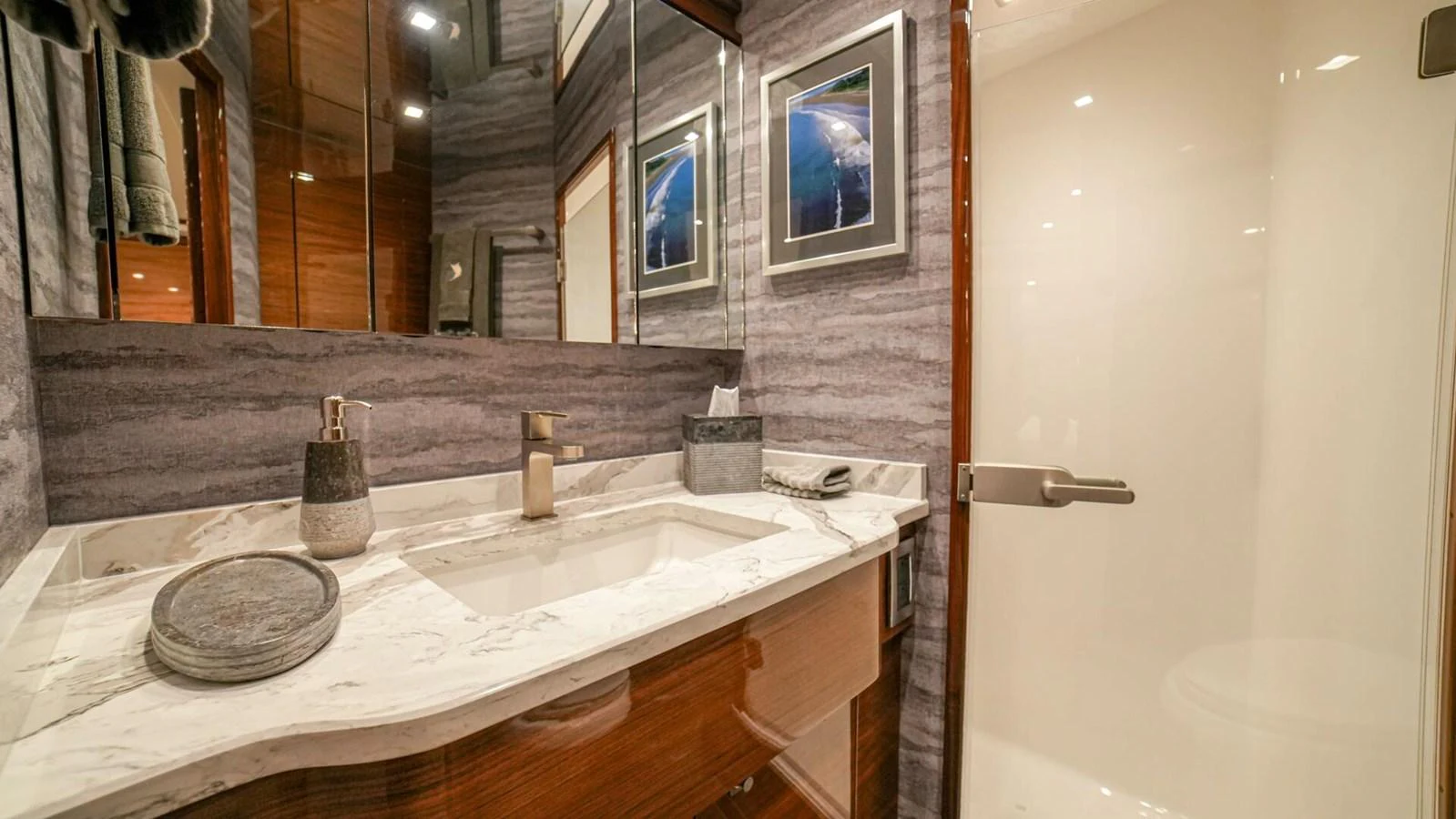 A luxurious yacht bathroom featuring elegant fixtures and modern design. aboard FREE SPOOL Yacht for Sale