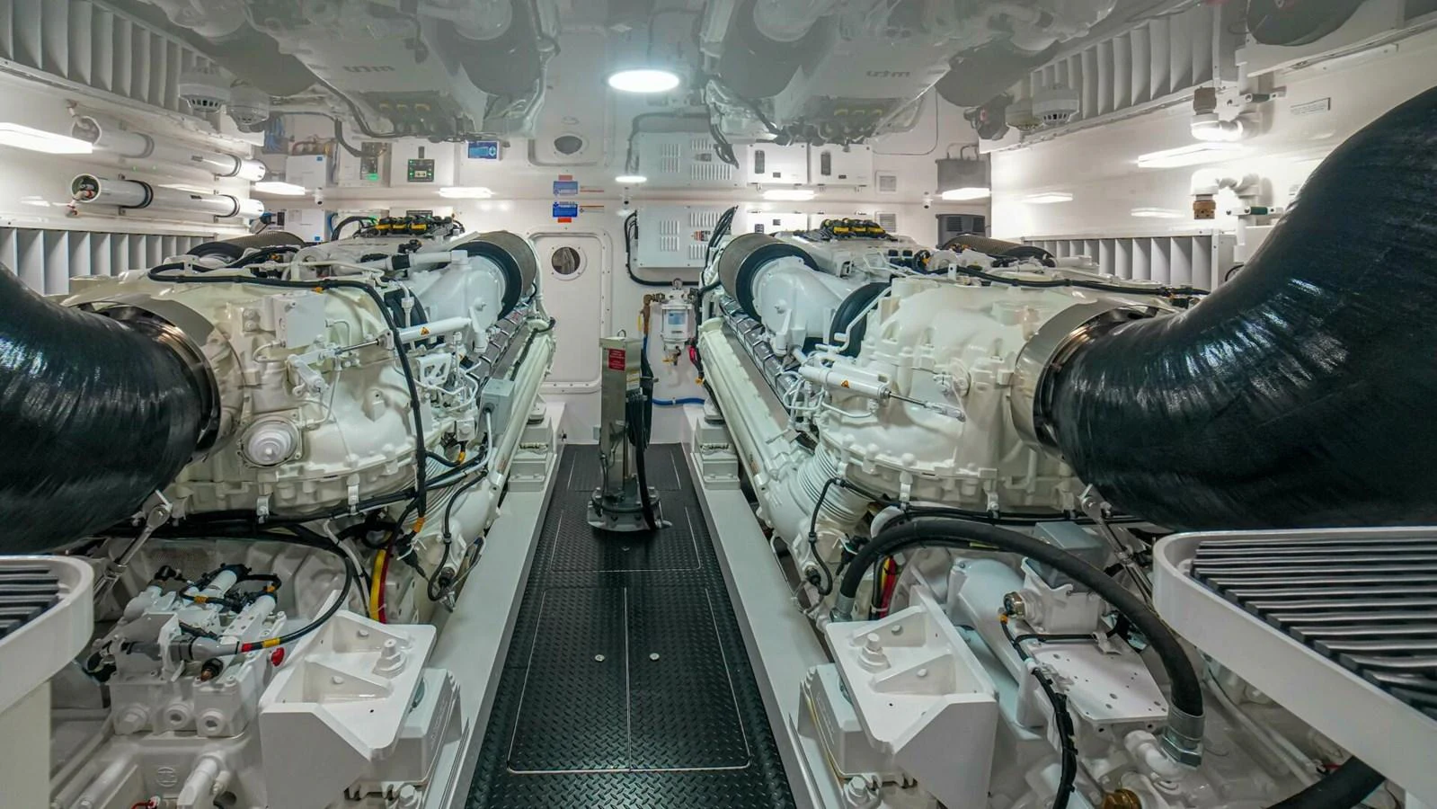 The engine room showcases powerful and meticulously maintained machinery. aboard FREE SPOOL Yacht for Sale