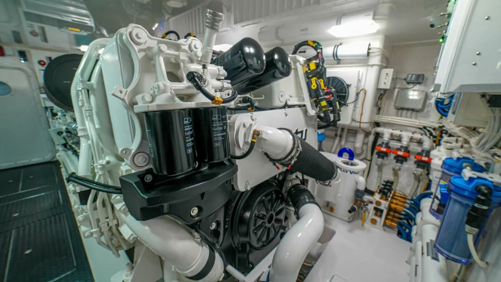 The image showcases the yacht's well-maintained engine room with advanced machinery. aboard FREE SPOOL Yacht for Sale
