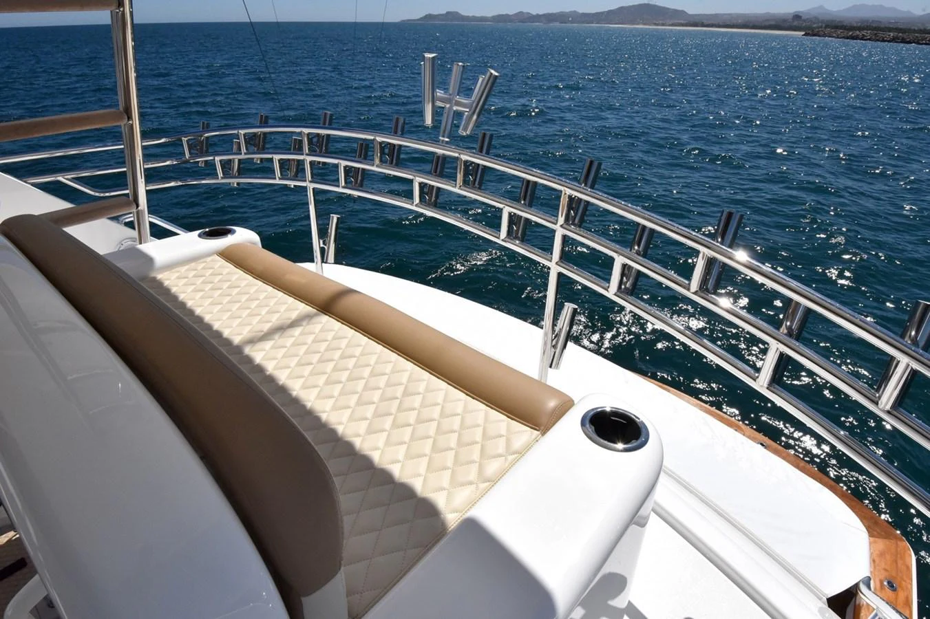 The sundeck offers a comfortable lounging area with stunning ocean views. aboard PRIMETIME Yacht for Sale