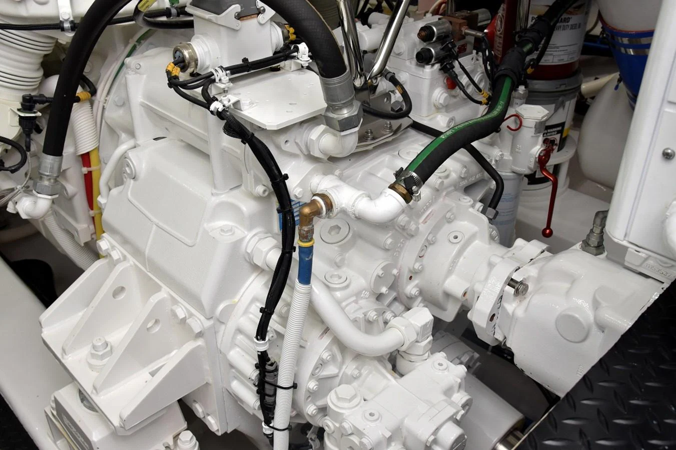 The image showcases the intricate details of the yacht's engine room components. aboard PRIMETIME Yacht for Sale