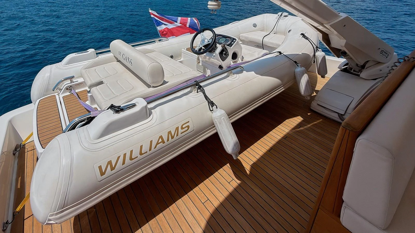 A sleek tender is securely positioned on the yacht's deck, ready for excursions. aboard GANS Yacht for Sale