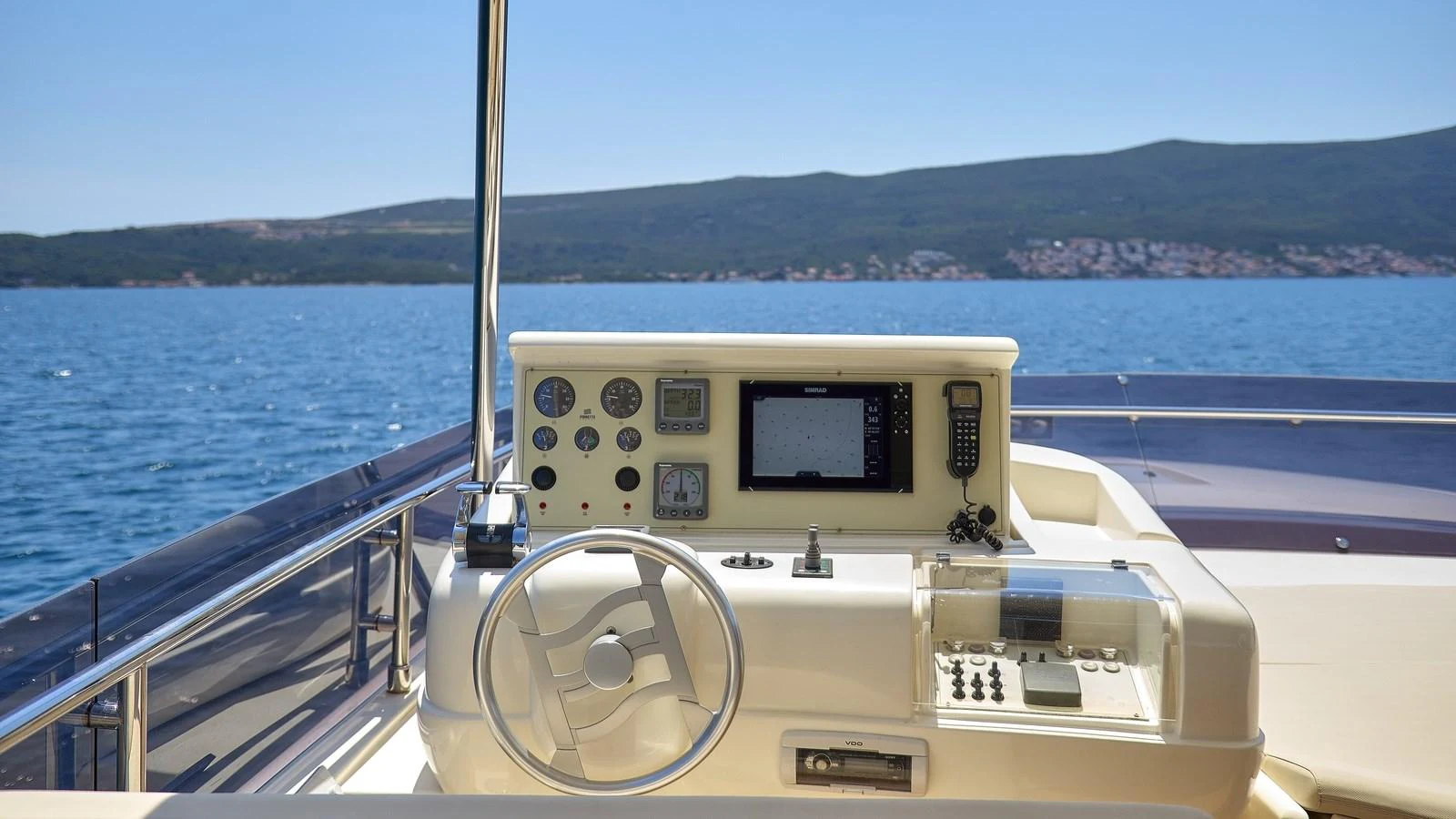 The helm station offers a comprehensive array of navigational instruments and controls. aboard GANS Yacht for Sale