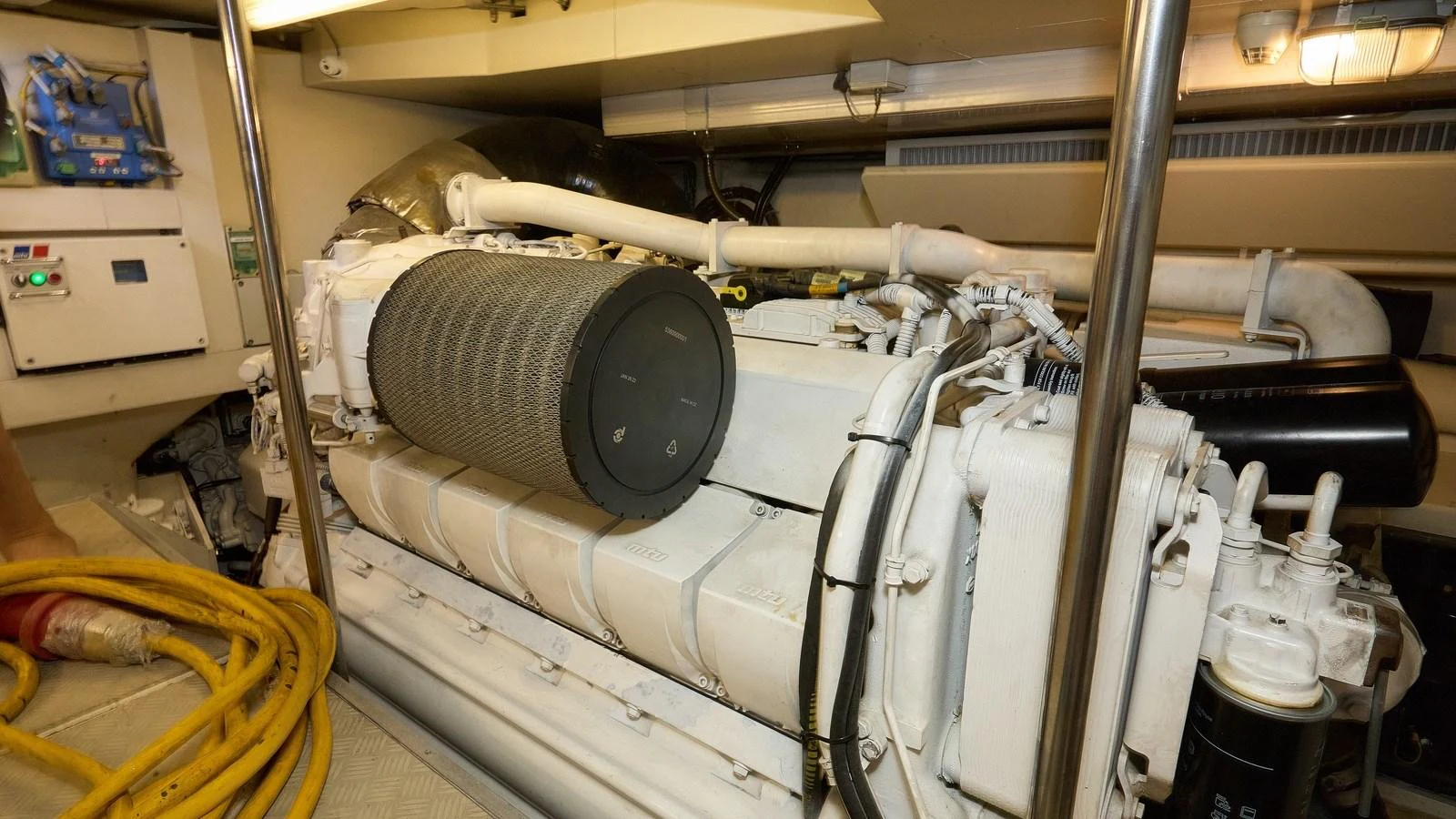The image showcases the yacht's engine room with a focus on the powerful machinery. aboard GANS Yacht for Sale