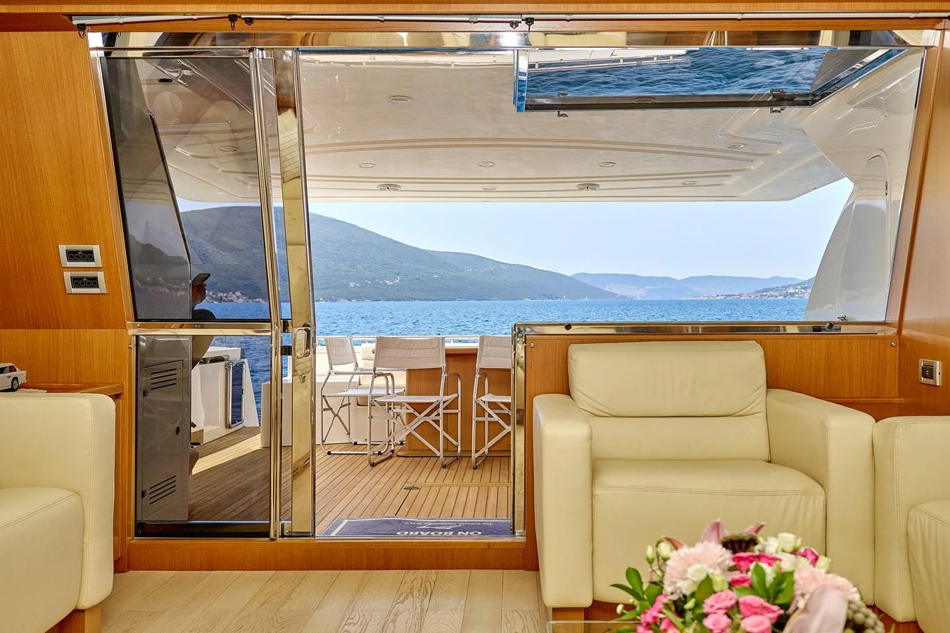 The salon opens up to a spacious aft deck with stunning sea views. aboard GANS Yacht for Sale