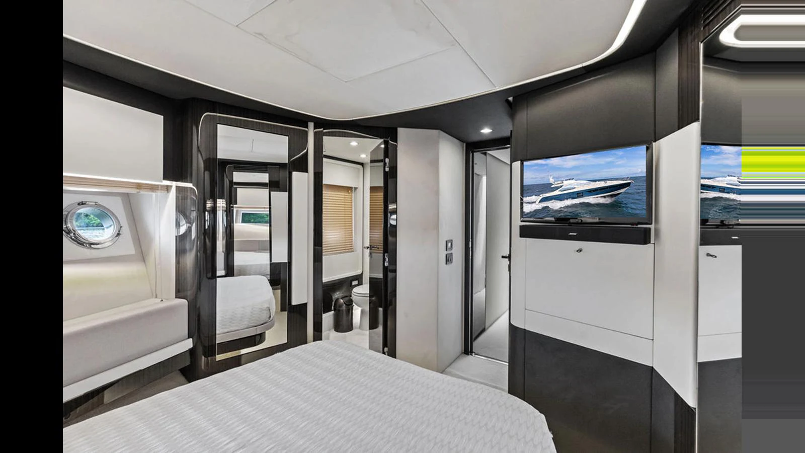 The master stateroom features modern decor with a comfortable bed and ample storage space. aboard VILLAGGIO Yacht for Sale