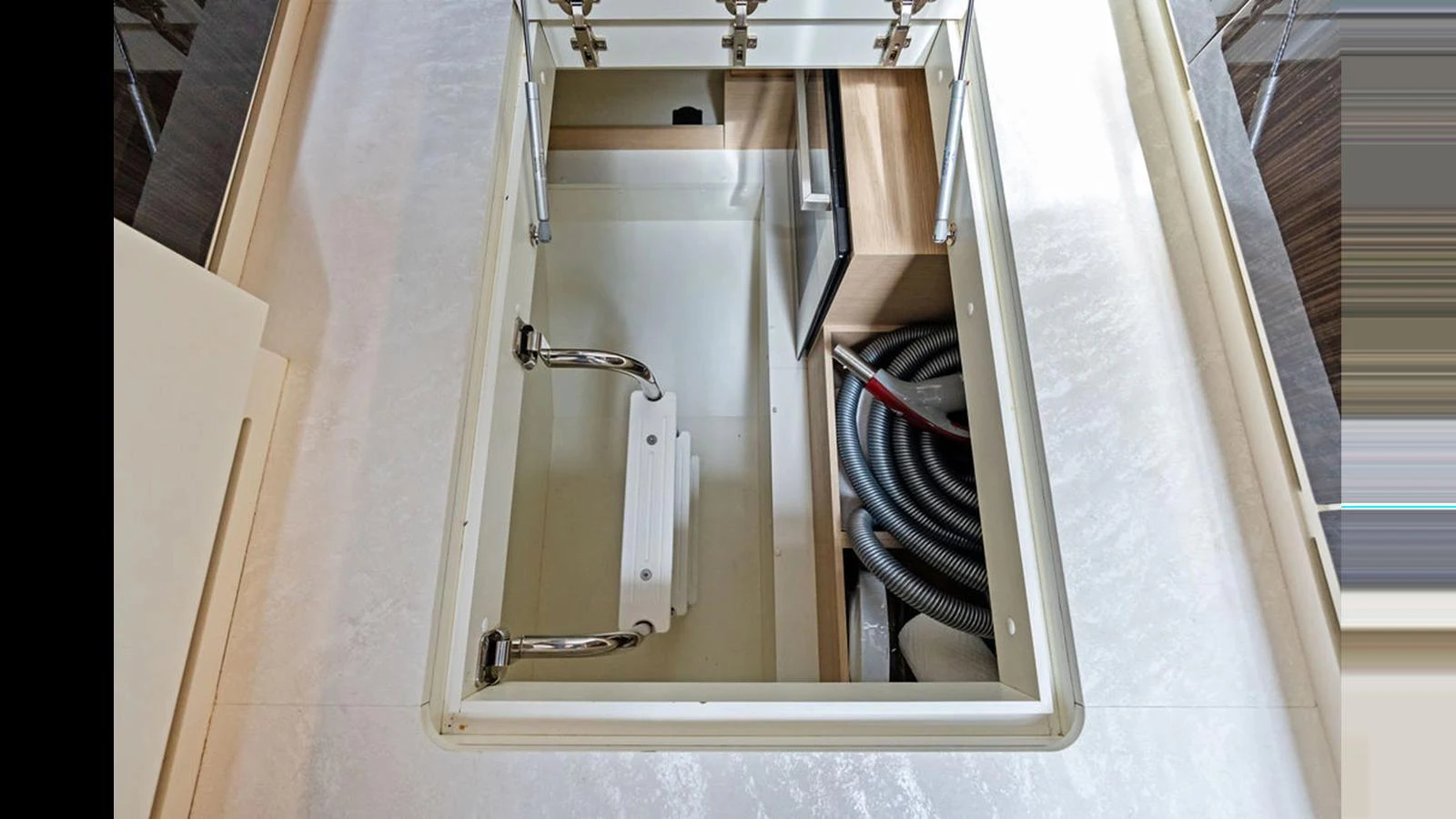 A detailed view of the yacht's storage compartment, showcasing its practical design. aboard VILLAGGIO Yacht for Sale