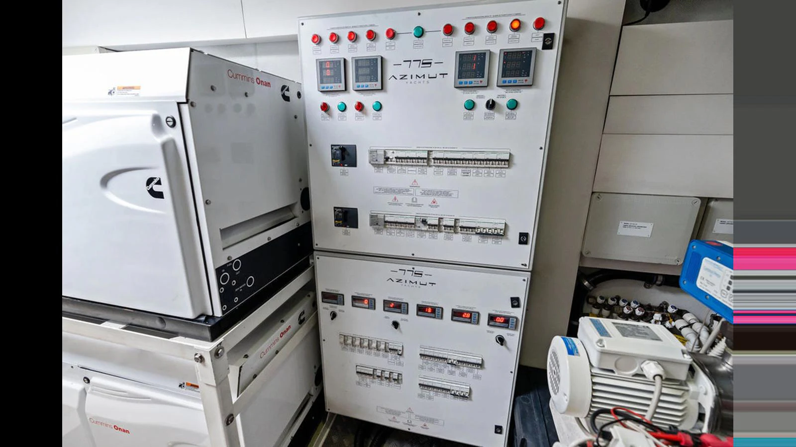 The yacht's control panel showcases advanced electrical systems and monitoring equipment. aboard VILLAGGIO Yacht for Sale