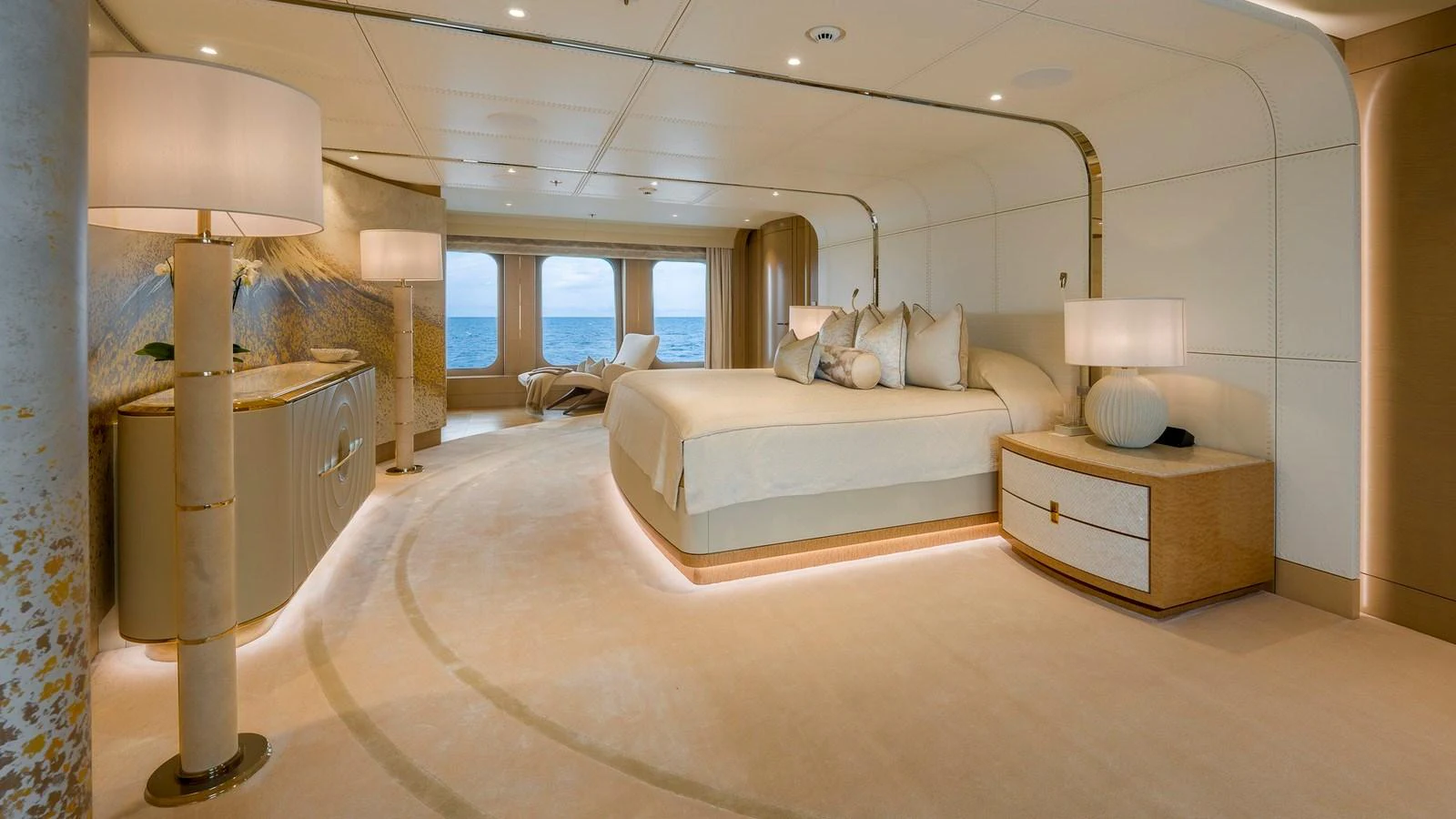 The master stateroom features elegant furnishings and expansive sea views. aboard NENINKA Yacht for Sale