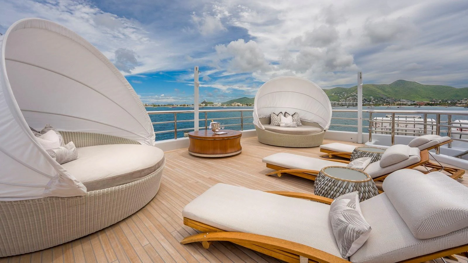 The sundeck offers luxurious lounging areas with stunning ocean views. aboard NENINKA Yacht for Sale