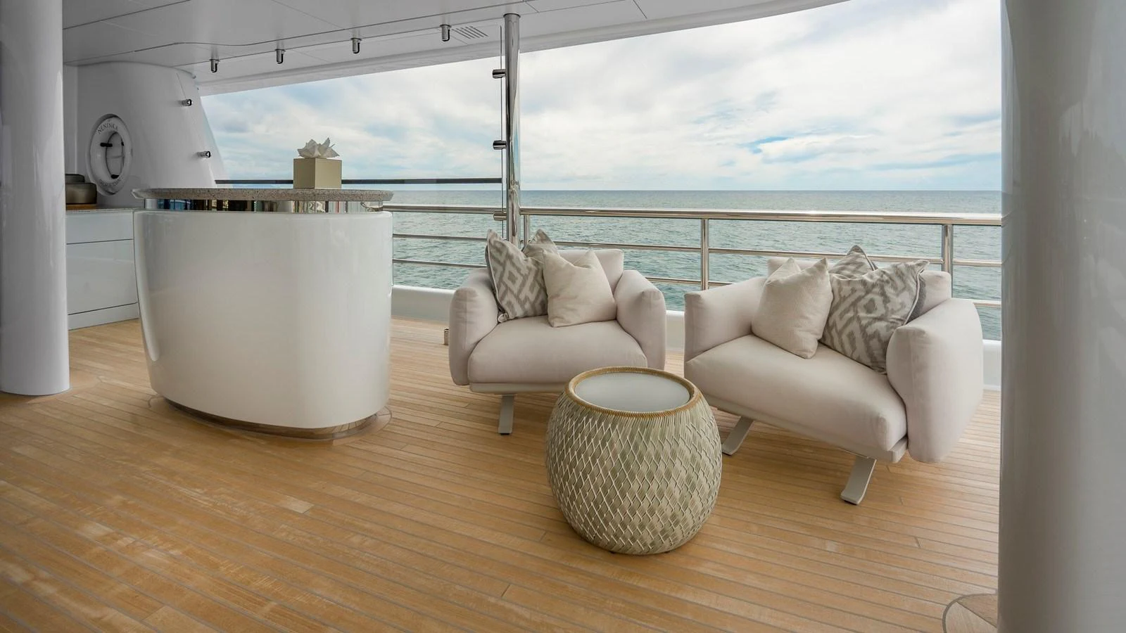 The aft deck features comfortable seating with ocean views. aboard NENINKA Yacht for Sale