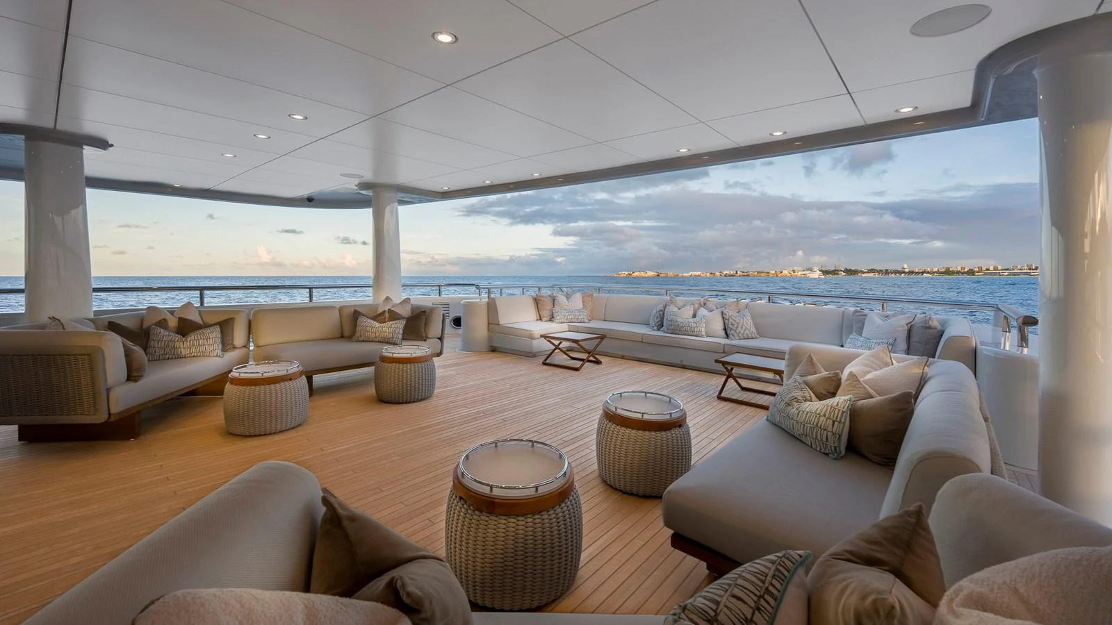 The aft deck features luxurious seating with stunning ocean views. aboard NENINKA Yacht for Sale
