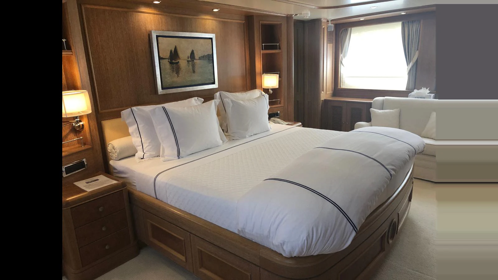 The master stateroom features a luxurious bed and elegant decor. aboard ALBATROSS Yacht for Sale