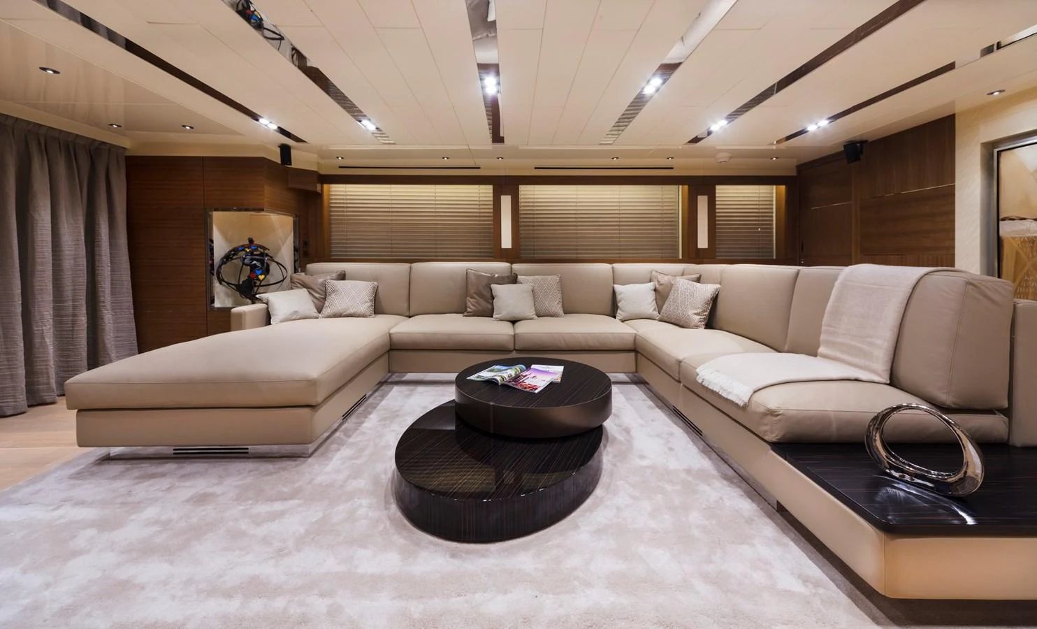 The salon features a spacious and elegant seating area with plush furnishings and modern decor. aboard MAXIMA Yacht for Sale