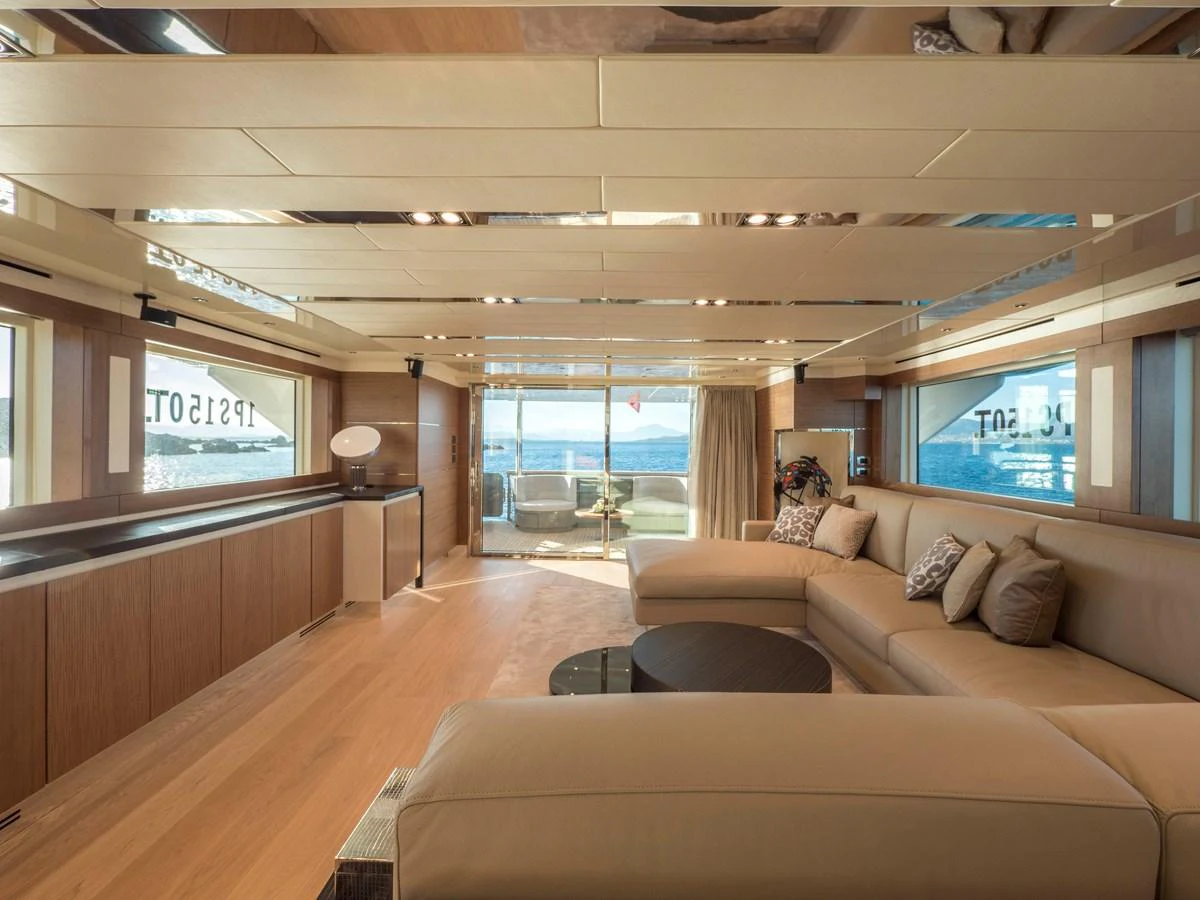 The salon features a spacious and elegant seating area with panoramic views. aboard MAXIMA Yacht for Sale