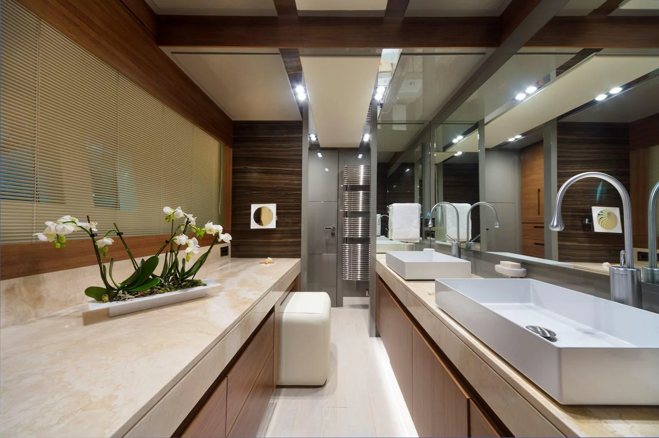 The yacht's bathroom features modern fixtures and elegant decor, creating a luxurious and serene atmosphere. aboard MAXIMA Yacht for Sale