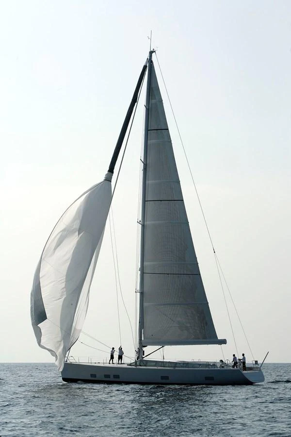 A sleek sailing yacht glides gracefully on the water with its sails unfurled. aboard S/Y SENTINEL Yacht for Sale