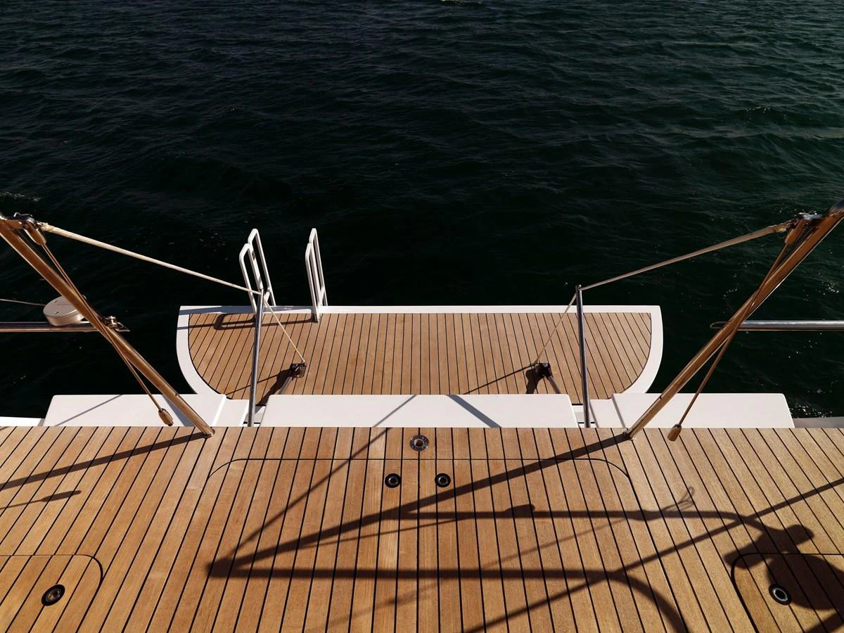 The yacht features a spacious swim platform with teak decking, perfect for easy water access. aboard S/Y SENTINEL Yacht for Sale