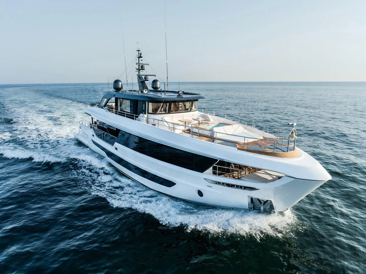 A sleek and modern yacht glides effortlessly across the open sea, showcasing its elegant design and luxurious amenities. aboard MAJESTY 100 TERRACE Yacht for Sale
