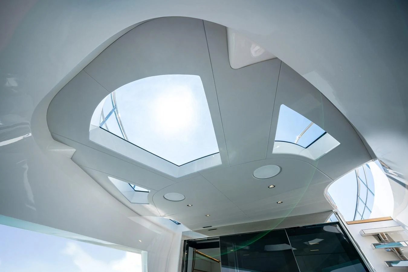The yacht features a modern interior with large skylights that allow natural light to flood the space. aboard MAJESTY 100 TERRACE Yacht for Sale