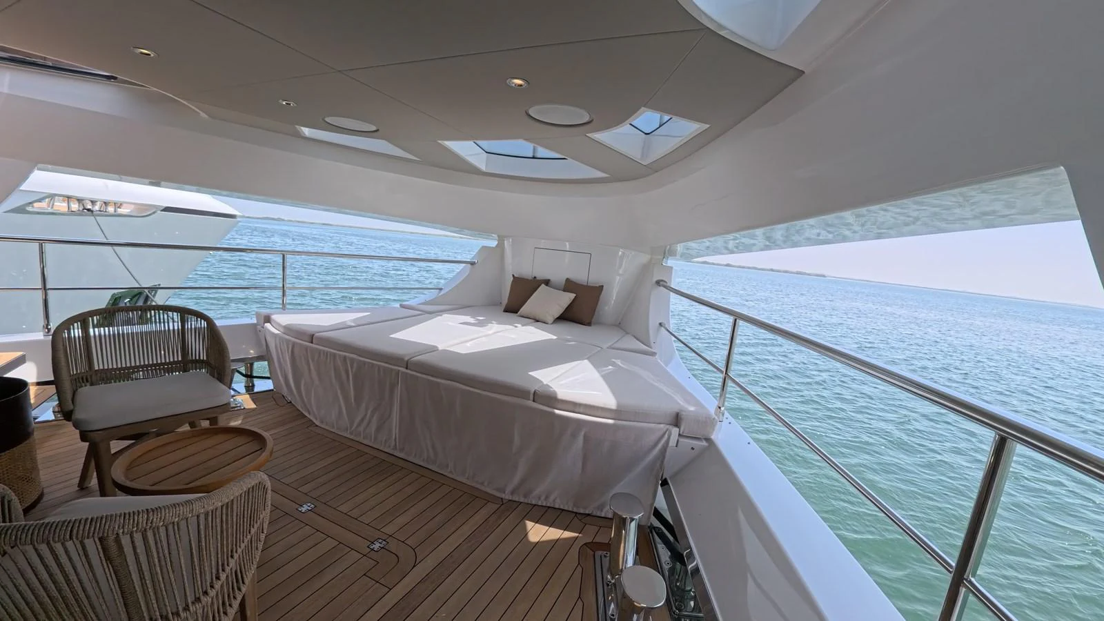 The aft deck features a spacious lounging area with a panoramic view of the sea. aboard MAJESTY 100 TERRACE Yacht for Sale
