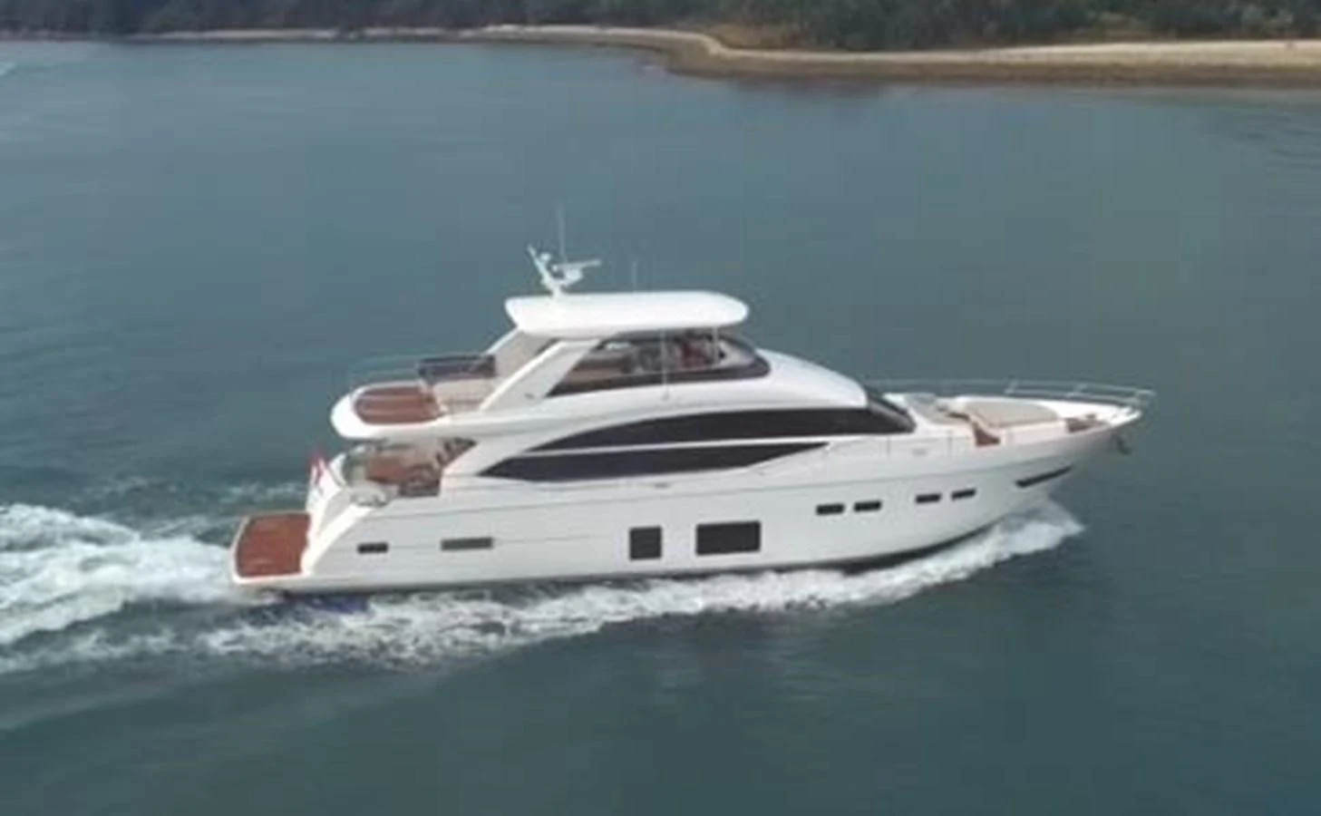 A sleek and modern yacht cruising gracefully on calm waters. aboard PRINCESS CHLOE Yacht for Sale